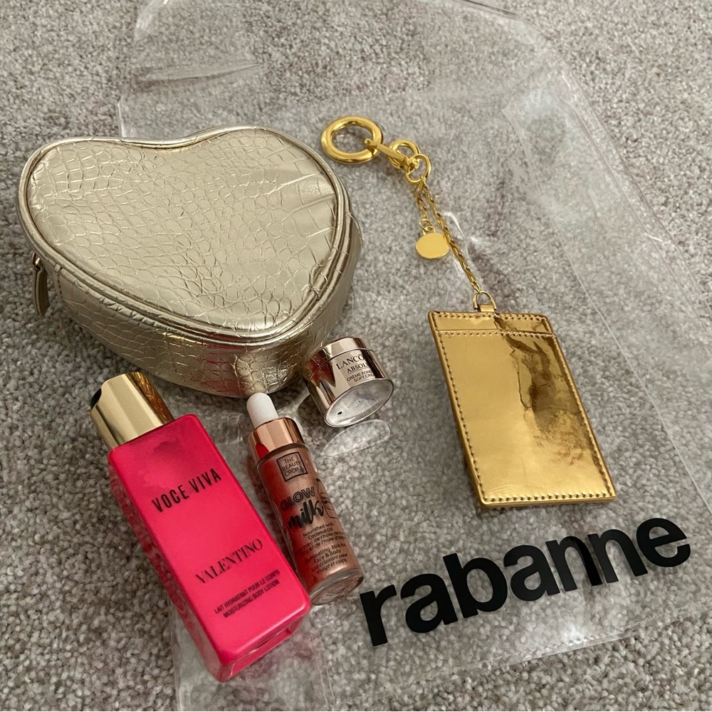 5 items - Rabanne Transparent Tote with Gold Heart Pouch, lotion and more! ⭐️ - Picture 2 of 12